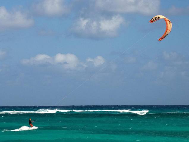 Praticante de kitesurfe Praticante de kitesurfe