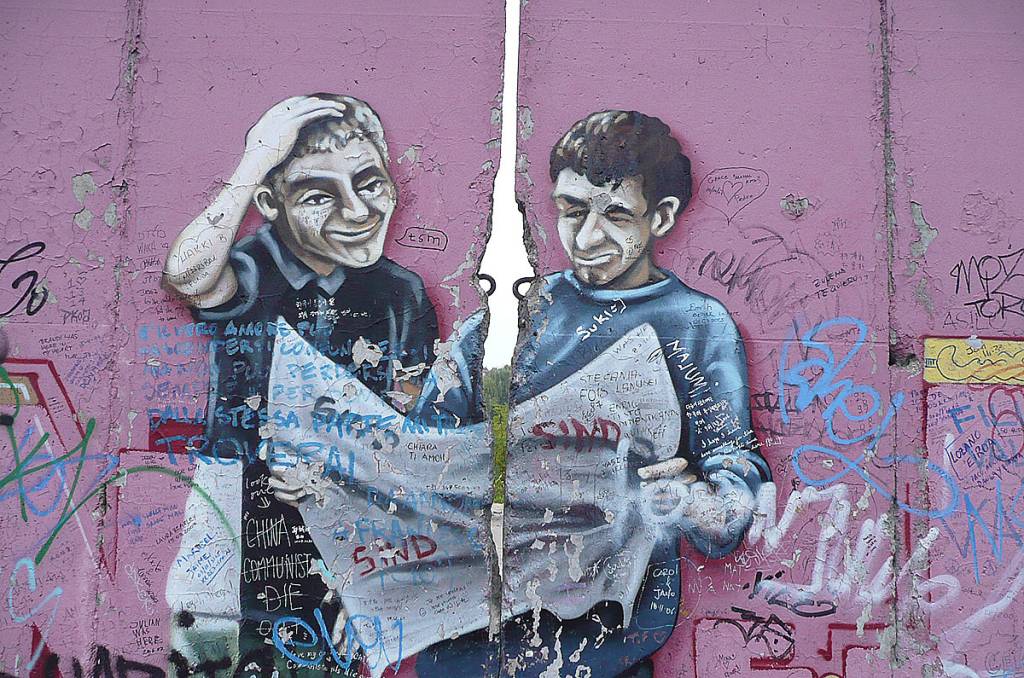 Renomados artistas t&ecirc;m hoje um espa&ccedil;o para exibir sua arte em pontos n&atilde;o derrubados do muro