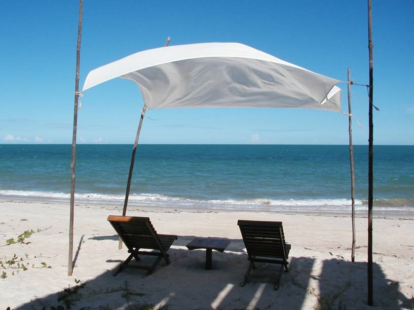 <strong>4. <a href="https://viajeaqui.abril.com.br/cidades/br-ba-ponta-do-corumbau" target="_blank" rel="noopener">Ponta do Corumbau (BA)</a></strong>Mesmo na alta temporada, a tranquilidade reina na Ponta do Corumbau. Há poucas pousadas e o acesso é difícil: para chegar aqui, os visitantes chegam em passeios de barco, a partir de Caraíva ou Cumuruxatiba, ou por 57 quilômetros de estrada de terra. A praia de Corumbau, a mais bonita da região, estende-se pela foz do Rio Corumbau, com águas calmas e esverdeadas. <a href="https://www.booking.com/searchresults.pt-br.html?aid=332455&lang=pt-br&sid=eedbe6de09e709d664615ac6f1b39a5d&sb=1&src=searchresults&src_elem=sb&error_url=https%3A%2F%2Fwww.booking.com%2Fsearchresults.pt-br.html%3Faid%3D332455%3Bsid%3Deedbe6de09e709d664615ac6f1b39a5d%3Bcity%3D-647482%3Bclass_interval%3D1%3Bdest_id%3D-635449%3Bdest_type%3Dcity%3Bdtdisc%3D0%3Bfrom_sf%3D1%3Bgroup_adults%3D2%3Bgroup_children%3D0%3Binac%3D0%3Bindex_postcard%3D0%3Blabel_click%3Dundef%3Bno_rooms%3D1%3Boffset%3D0%3Bpostcard%3D0%3Braw_dest_type%3Dcity%3Broom1%3DA%252CA%3Bsb_price_type%3Dtotal%3Bsearch_selected%3D1%3Bsrc%3Dsearchresults%3Bsrc_elem%3Dsb%3Bss%3DCara%25C3%25ADva%252C%2520%25E2%2580%258BBahia%252C%2520%25E2%2580%258BBrasil%3Bss_all%3D0%3Bss_raw%3DCara%25C3%25ADva%3Bssb%3Dempty%3Bsshis%3D0%3Bssne_untouched%3DItacar%25C3%25A9%26%3B&ss=Bahia%2C+%E2%80%8BBrasil&ssne=Cara%C3%ADva&ssne_untouched=Cara%C3%ADva&city=-635449&checkin_monthday=&checkin_month=&checkin_year=&checkout_monthday=&checkout_month=&checkout_year=&no_rooms=1&group_adults=2&group_children=0&from_sf=1&ss_raw=Bahia&ac_position=0&ac_langcode=xb&dest_id=644&dest_type=region&search_pageview_id=89a28d53979a0100&search_selected=true&search_pageview_id=89a28d53979a0100&ac_suggestion_list_length=5&ac_suggestion_theme_list_length=0" target="_blank" rel="noopener"><em>Busque hospedagens na Bahia no Booking.com</em></a> <strong>4. <a href="https://viajeaqui.abril.com.br/cidades/br-ba-ponta-do-corumbau" target="_blank" rel="noopener">Ponta do Corumbau (BA)</a></strong>Mesmo na alta temporada, a tranquilidade reina na Ponta do Corumbau. Há poucas pousadas e o acesso é difícil: para chegar aqui, os visitantes chegam em passeios de barco, a partir de Caraíva ou Cumuruxatiba, ou por 57 quilômetros de estrada de terra. A praia de Corumbau, a mais bonita da região, estende-se pela foz do Rio Corumbau, com águas calmas e esverdeadas. <a href="https://www.booking.com/searchresults.pt-br.html?aid=332455&lang=pt-br&sid=eedbe6de09e709d664615ac6f1b39a5d&sb=1&src=searchresults&src_elem=sb&error_url=https%3A%2F%2Fwww.booking.com%2Fsearchresults.pt-br.html%3Faid%3D332455%3Bsid%3Deedbe6de09e709d664615ac6f1b39a5d%3Bcity%3D-647482%3Bclass_interval%3D1%3Bdest_id%3D-635449%3Bdest_type%3Dcity%3Bdtdisc%3D0%3Bfrom_sf%3D1%3Bgroup_adults%3D2%3Bgroup_children%3D0%3Binac%3D0%3Bindex_postcard%3D0%3Blabel_click%3Dundef%3Bno_rooms%3D1%3Boffset%3D0%3Bpostcard%3D0%3Braw_dest_type%3Dcity%3Broom1%3DA%252CA%3Bsb_price_type%3Dtotal%3Bsearch_selected%3D1%3Bsrc%3Dsearchresults%3Bsrc_elem%3Dsb%3Bss%3DCara%25C3%25ADva%252C%2520%25E2%2580%258BBahia%252C%2520%25E2%2580%258BBrasil%3Bss_all%3D0%3Bss_raw%3DCara%25C3%25ADva%3Bssb%3Dempty%3Bsshis%3D0%3Bssne_untouched%3DItacar%25C3%25A9%26%3B&ss=Bahia%2C+%E2%80%8BBrasil&ssne=Cara%C3%ADva&ssne_untouched=Cara%C3%ADva&city=-635449&checkin_monthday=&checkin_month=&checkin_year=&checkout_monthday=&checkout_month=&checkout_year=&no_rooms=1&group_adults=2&group_children=0&from_sf=1&ss_raw=Bahia&ac_position=0&ac_langcode=xb&dest_id=644&dest_type=region&search_pageview_id=89a28d53979a0100&search_selected=true&search_pageview_id=89a28d53979a0100&ac_suggestion_list_length=5&ac_suggestion_theme_list_length=0" target="_blank" rel="noopener"><em>Busque hospedagens na Bahia no Booking.com</em></a>